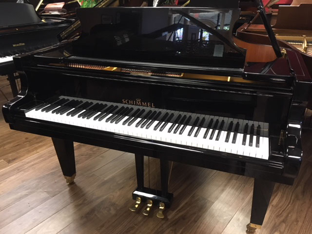 Schimmel 5’9” grand piano, hand-crafted in Germany in 1990, one-owner, well-maintained this particular model is a K175, which is the upper level